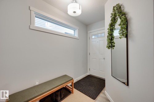 Entryway with baseboards - 4 Caledon Crescent, Spruce Grove, AB - Indoor Photo Showing Other Room