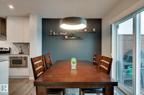 Dining room featuring light wood finished floors - 4 Caledon Crescent, Spruce Grove, AB - Indoor Photo Showing Dining Room