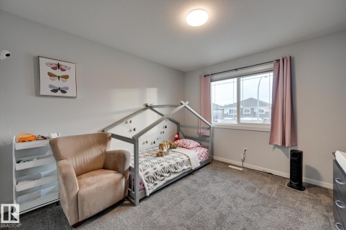 Carpeted bedroom featuring baseboards - 4 Caledon Crescent, Spruce Grove, AB - Indoor Photo Showing Bedroom