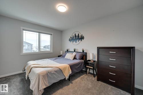 Carpeted bedroom featuring baseboards - 4 Caledon Crescent, Spruce Grove, AB - Indoor Photo Showing Bedroom