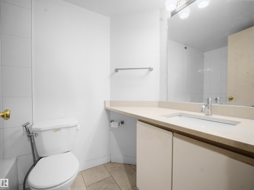 Full bathroom with light tile patterned floors and vanity - 108 5065 31 Avenue, Edmonton, AB - Indoor Photo Showing Bathroom