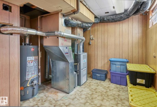 Utility room with heating unit and gas water heater - 11127 71 Avenue, Edmonton, AB - Indoor Photo Showing Laundry Room