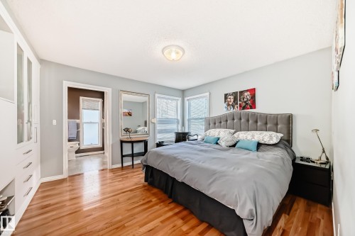Bedroom featuring light wood-type flooring and baseboards - 4 Harriott Court, St. Albert, AB - Indoor Photo Showing Bedroom