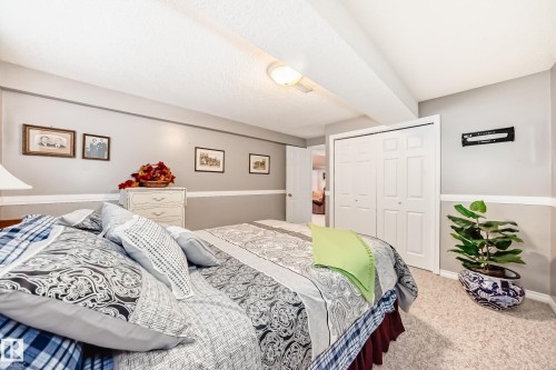 Bedroom with carpet floors and a closet - 4 Harriott Court, St. Albert, AB - Indoor Photo Showing Bedroom