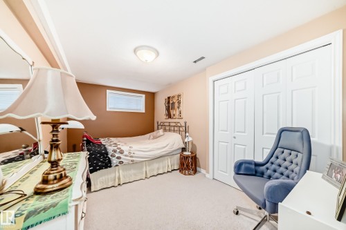 Bedroom with carpet, a closet, and an office area - 4 Harriott Court, St. Albert, AB - Indoor Photo Showing Bedroom