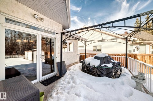 Snow covered patio with a gazebo and a wooden deck - 4 Harriott Court, St. Albert, AB - Outdoor With Deck Patio Veranda With Exterior