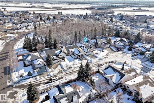 Snowy aerial view featuring a residential view - 4 Harriott Court, St. Albert, AB - Outdoor With View