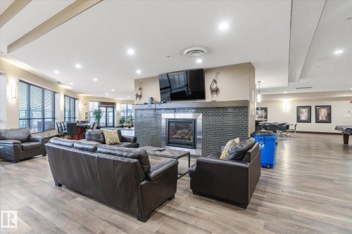257 7805 71 Street, Edmonton, AB - Indoor Photo Showing Living Room With Fireplace