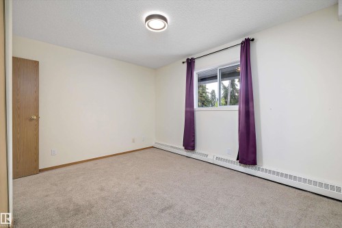 101 4812 51 Avenue, Stony Plain, AB - Indoor Photo Showing Other Room
