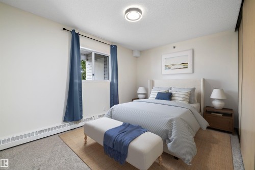 101 4812 51 Avenue, Stony Plain, AB - Indoor Photo Showing Bedroom