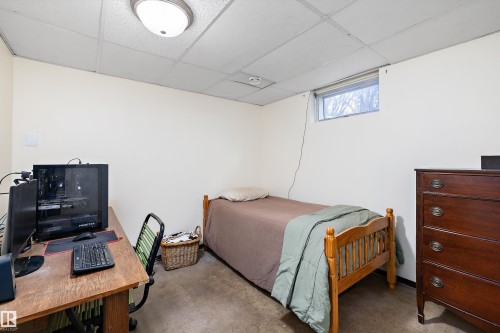 Bedroom featuring a paneled ceiling and a desk - 5703 143 Avenue, Edmonton, AB - Indoor Photo Showing Bedroom