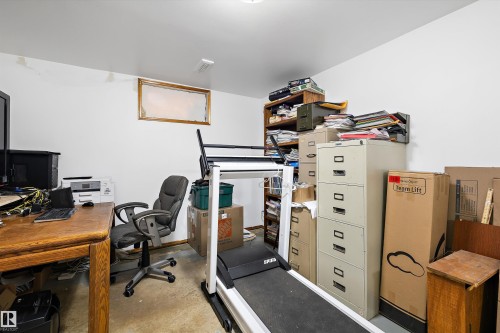 Office area with concrete flooring - 5703 143 Avenue, Edmonton, AB - Indoor Photo Showing Other Room