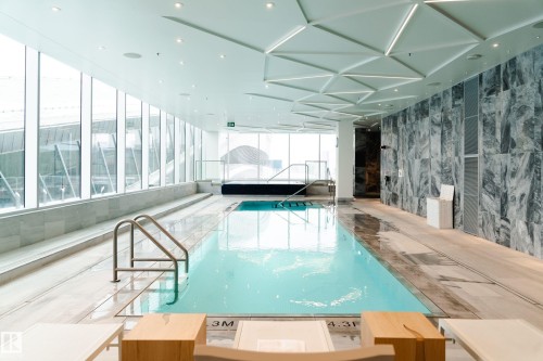 Indoor pool featuring a sunroom - 3901 10360 102 Street, Edmonton, AB - Indoor Photo Showing Other Room With In Ground Pool