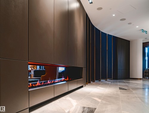 Building lobby featuring recessed lighting and a decorative wall - 3901 10360 102 Street, Edmonton, AB - Indoor Photo Showing Other Room