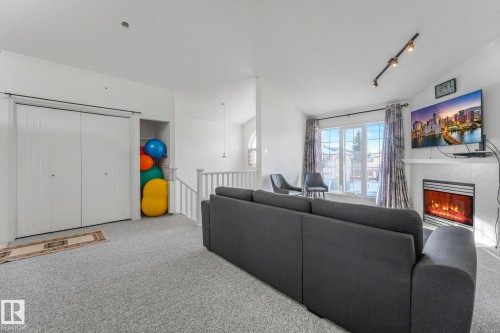 11105 9 Avenue, Edmonton, AB - Indoor Photo Showing Other Room With Fireplace