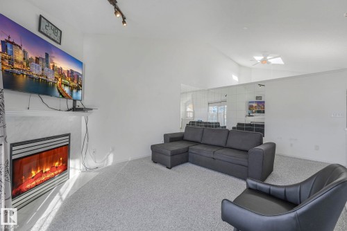 11105 9 Avenue, Edmonton, AB - Indoor Photo Showing Living Room With Fireplace