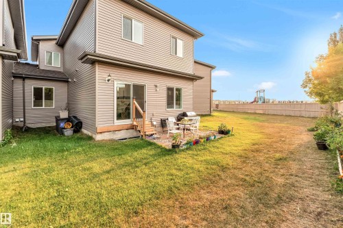 Back of house featuring a patio and entry steps - 1522 17 Avenue, Edmonton, AB - Outdoor With Exterior