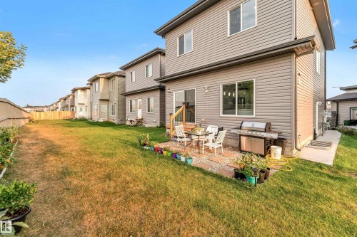 Back of house featuring a patio - 1522 17 Avenue, Edmonton, AB - Outdoor With Exterior