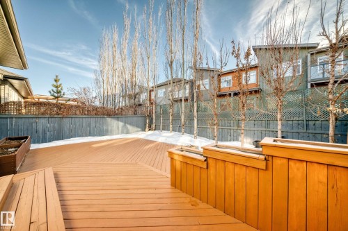 Wooden terrace featuring a fenced backyard - 7719 Getty Wynd, Edmonton, AB - Outdoor With Exterior
