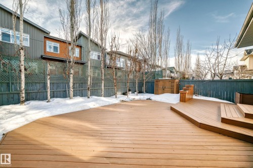 Deck with a fenced backyard and a residential view - 7719 Getty Wynd, Edmonton, AB - Outdoor With Exterior