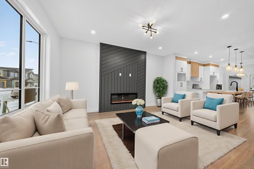 436 Crystal Creek Link, Leduc, AB - Indoor Photo Showing Living Room With Fireplace