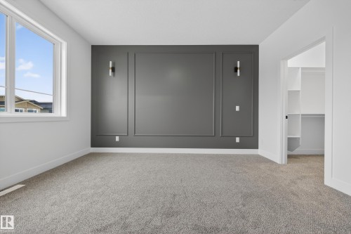 Empty room with light carpet - 436 Crystal Creek Link, Leduc, AB - Indoor Photo Showing Other Room