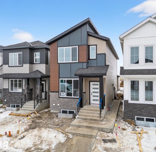 Contemporary home featuring roof with shingles - 436 Crystal Creek Link, Leduc, AB - Outdoor With Facade