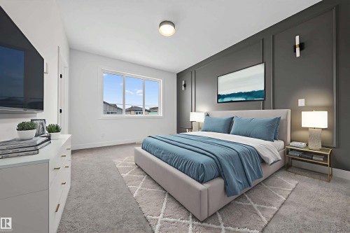 Bedroom with light carpet and baseboards - 436 Crystal Creek Link, Leduc, AB - Indoor Photo Showing Bedroom