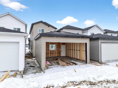View of front facade featuring a garage - 436 Crystal Creek Link, Leduc, AB - Outdoor