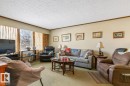 7319 86 Avenue, Edmonton, AB  - Indoor Photo Showing Living Room 