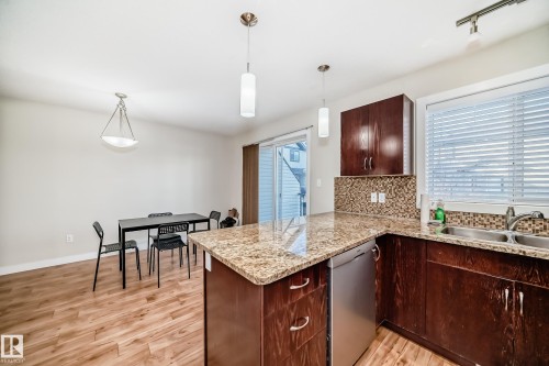 2 4950 Terwillegar Common, Edmonton, AB - Indoor Photo Showing Kitchen With Double Sink