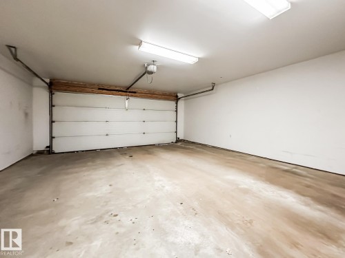 2 4950 Terwillegar Common, Edmonton, AB - Indoor Photo Showing Garage