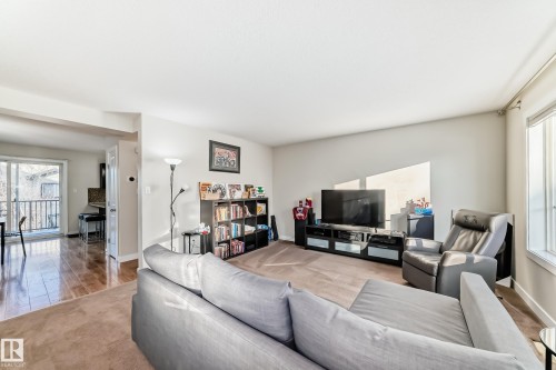 2 4950 Terwillegar Common, Edmonton, AB - Indoor Photo Showing Living Room