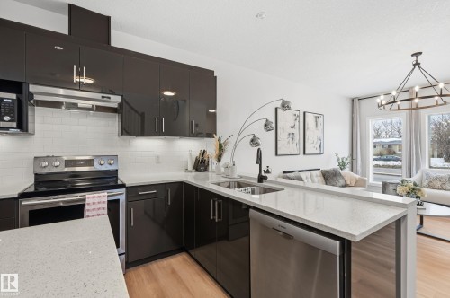 10736 149 Street, Edmonton, AB - Indoor Photo Showing Kitchen With Stainless Steel Kitchen With Double Sink With Upgraded Kitchen