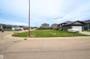 Expansive corner lot featuring a level, grassed area and direct street access - 4930 57 Avenue, Cold Lake, AB 
