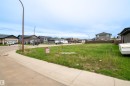 Expansive residential lot featuring a level, grassy terrain - 4930 57 Avenue, Cold Lake, AB 