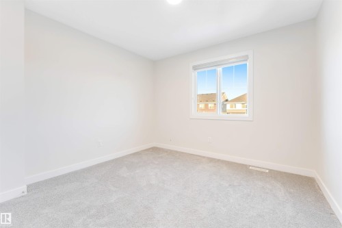 560 Glenridding Ravine Drive Sw, Edmonton, AB - Indoor Photo Showing Other Room