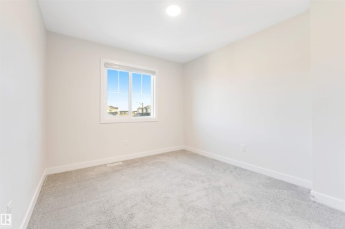 560 Glenridding Ravine Drive Sw, Edmonton, AB - Indoor Photo Showing Other Room