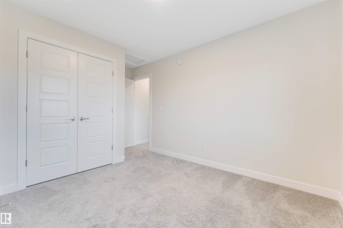 560 Glenridding Ravine Drive Sw, Edmonton, AB - Indoor Photo Showing Other Room