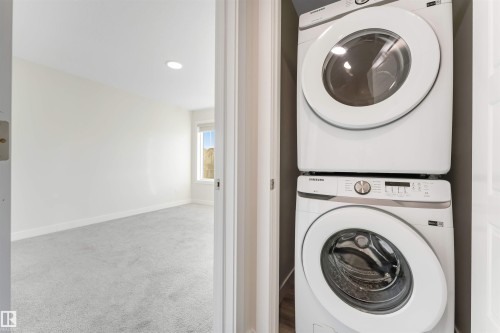 560 Glenridding Ravine Drive Sw, Edmonton, AB - Indoor Photo Showing Laundry Room