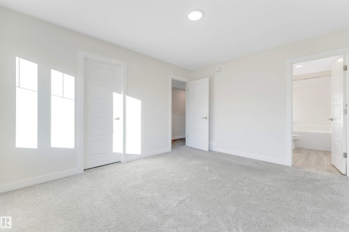 560 Glenridding Ravine Drive Sw, Edmonton, AB - Indoor Photo Showing Other Room