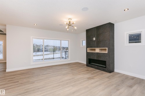 162 Edgewater Circle, Leduc, AB - Indoor Photo Showing Living Room With Fireplace