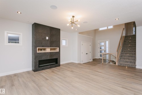162 Edgewater Circle, Leduc, AB - Indoor Photo Showing Living Room With Fireplace