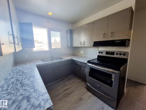 7920 Argyll Road, Edmonton, AB - Indoor Photo Showing Kitchen With Double Sink