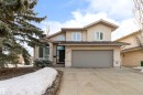 View of front of property featuring stucco siding, a garage, and concrete driveway - 519 Buchanan Road, Edmonton, AB  - Outdoor With Facade 