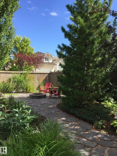 View of patio / terrace with an outdoor fire pit - 519 Buchanan Road, Edmonton, AB - Outdoor
