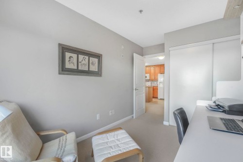 Office space with baseboards and light carpet - 415 530 Hooke Road, Edmonton, AB - Indoor