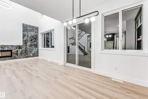 6310 20 Street, Rural Leduc County, AB - Indoor Photo Showing Other Room With Fireplace
