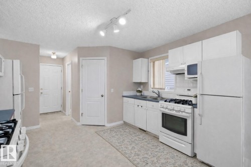4804 147 Avenue, Edmonton, AB - Indoor Photo Showing Kitchen With Double Sink
