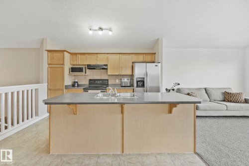 119 Brintnell Boulevard, Edmonton, AB - Indoor Photo Showing Kitchen With Double Sink
